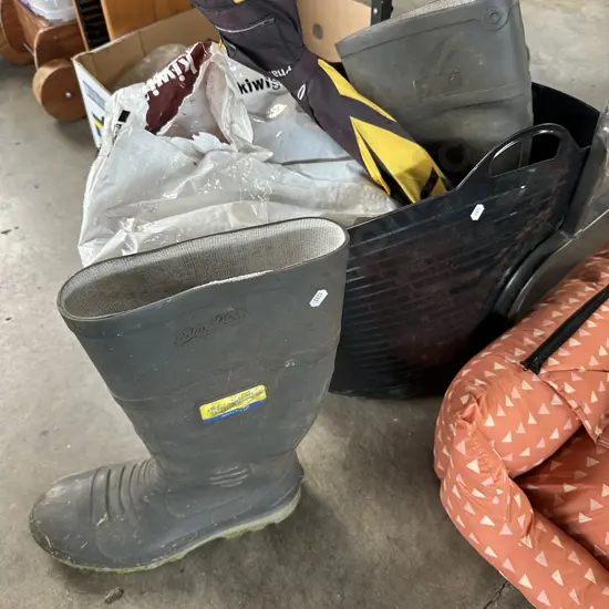 large steel cap blundstone gumboots, potting mix, umbella and bin