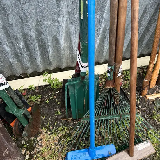 Spades, fork, rakes and brooms.