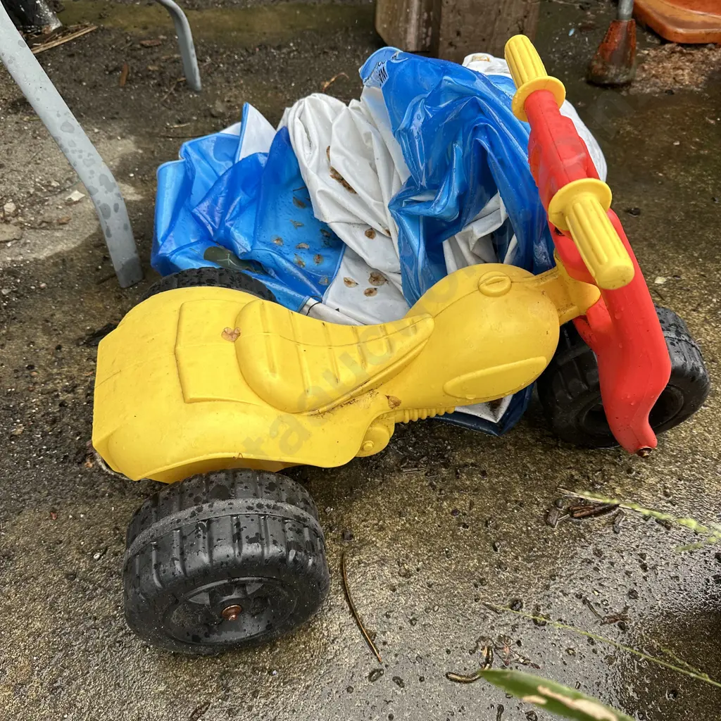 Toy bike and blow up pool. Image 1++