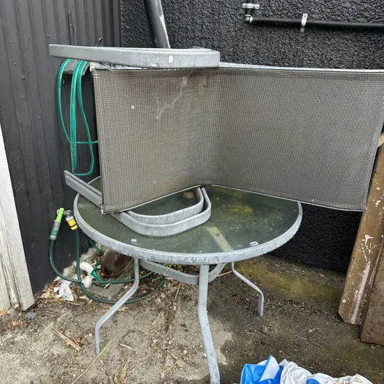 Table and pair of chairs.