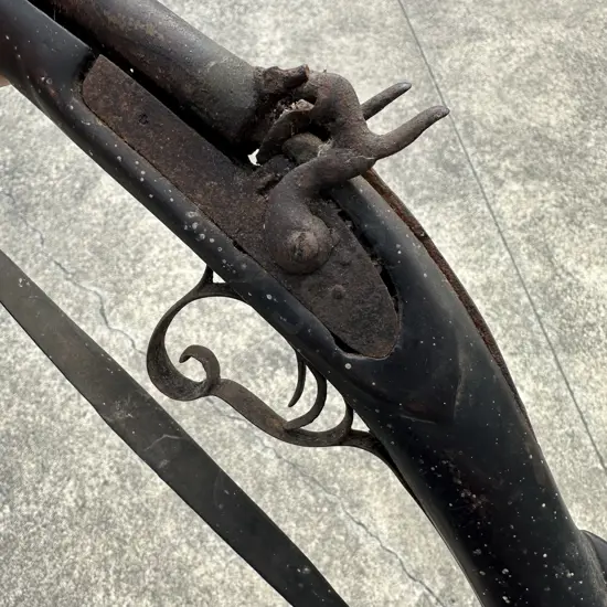 early African double flint action riffle with carved stock