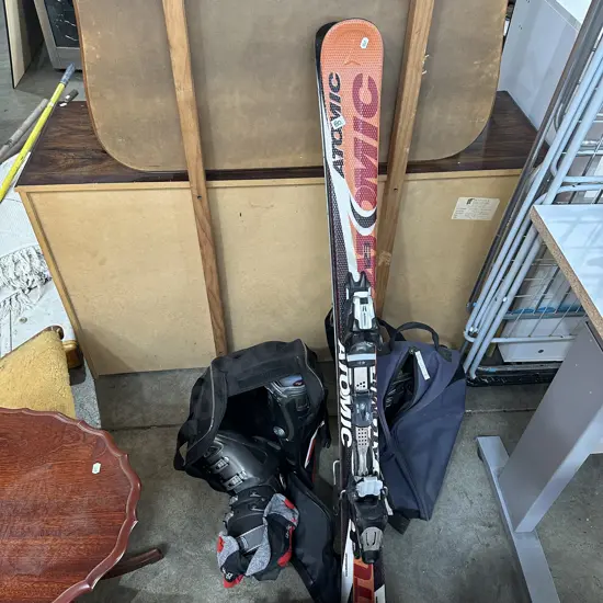 2 pr ski boots and mini skis