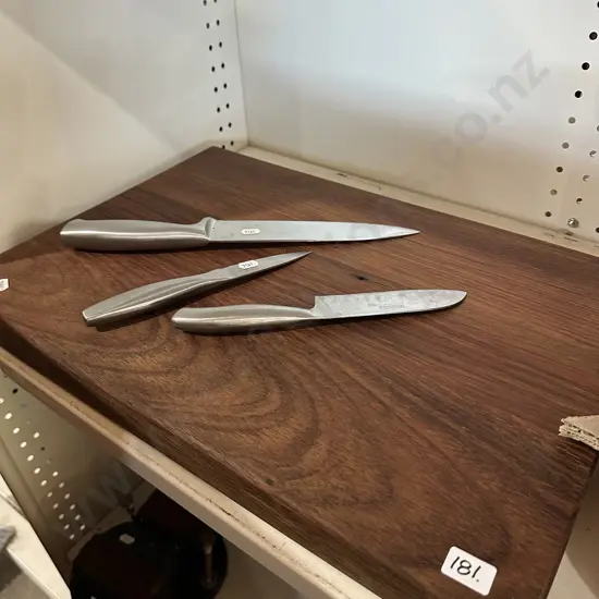 large chopping board and knives