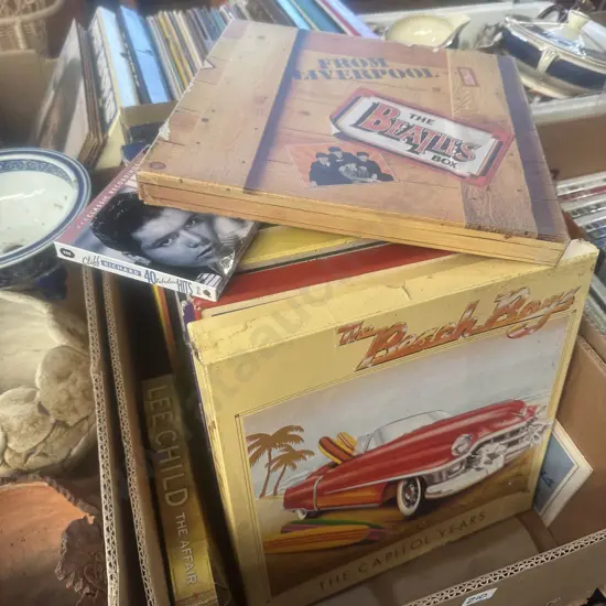 Record box sets including The Beatles and The beach boys.