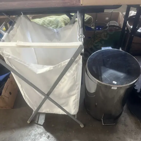Pedal bin and laundry basket.