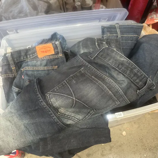 Lidded bin with Levi jeans plus others.