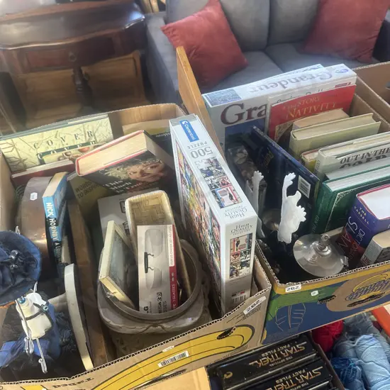 2 boxes jigsaws, books, mirror, silverware etc