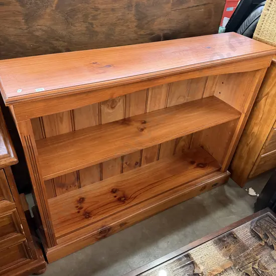 wooden bookshelf with repair