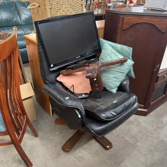 average lounge chair with stool and TV not working