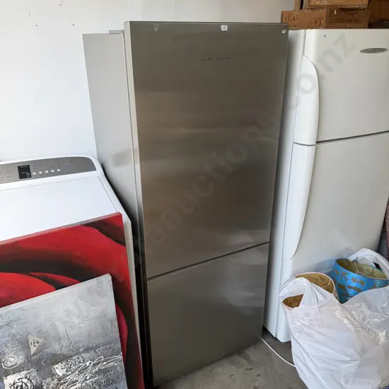 very tidy F&P fridge freezer