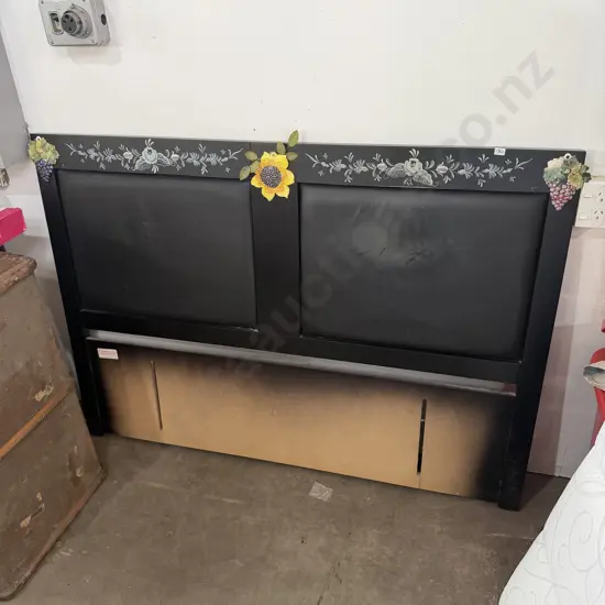 3 hand made pieces of  pottery attached to a headboard