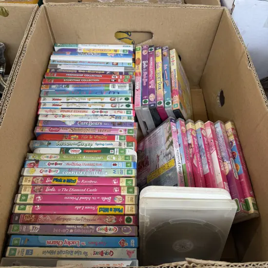Two boxes silverware, scales, childrens DVDs.