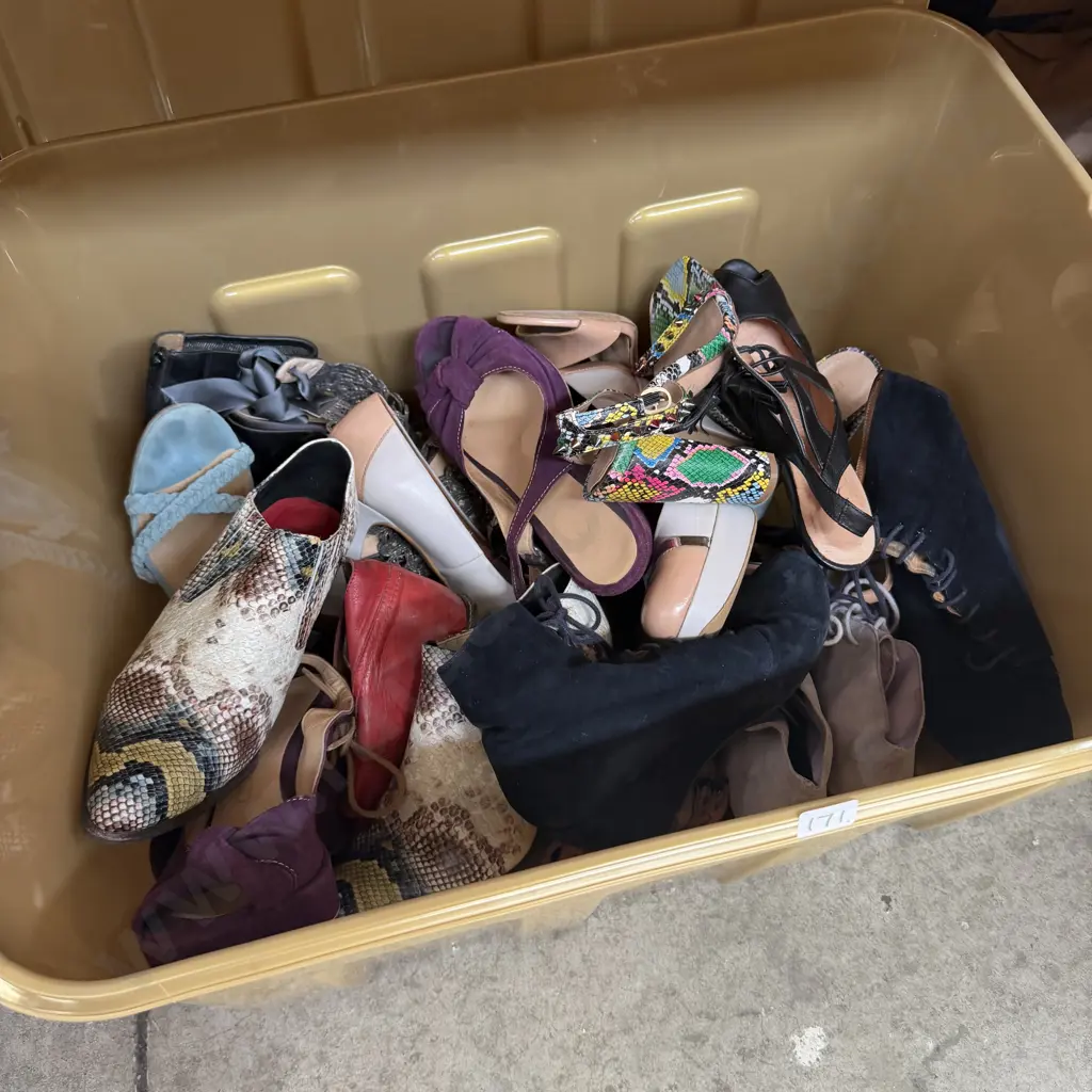 Lidded bin of shoes. Image 1++