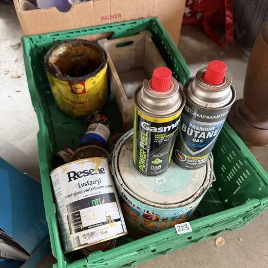 Collapsible crate with Shell grease can, full butane gas cans etc.