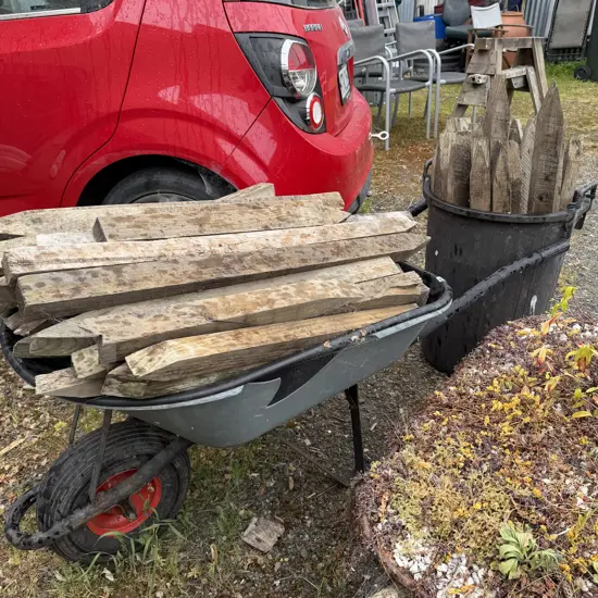 wheel barrow, plus stakes