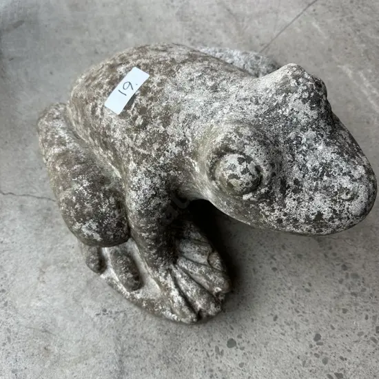 Large old concrete frog