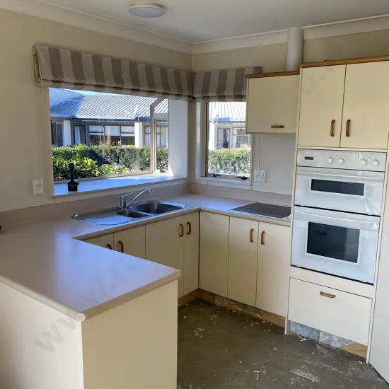 Small kitchen with oven and pantry