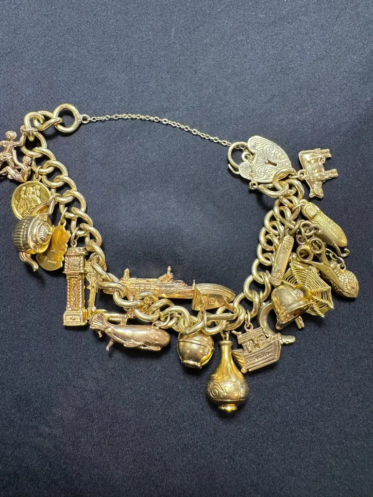 Gold charm bracelet Image 1++