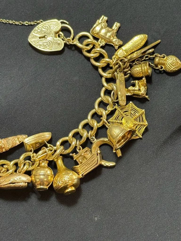 Gold charm bracelet Image 1++