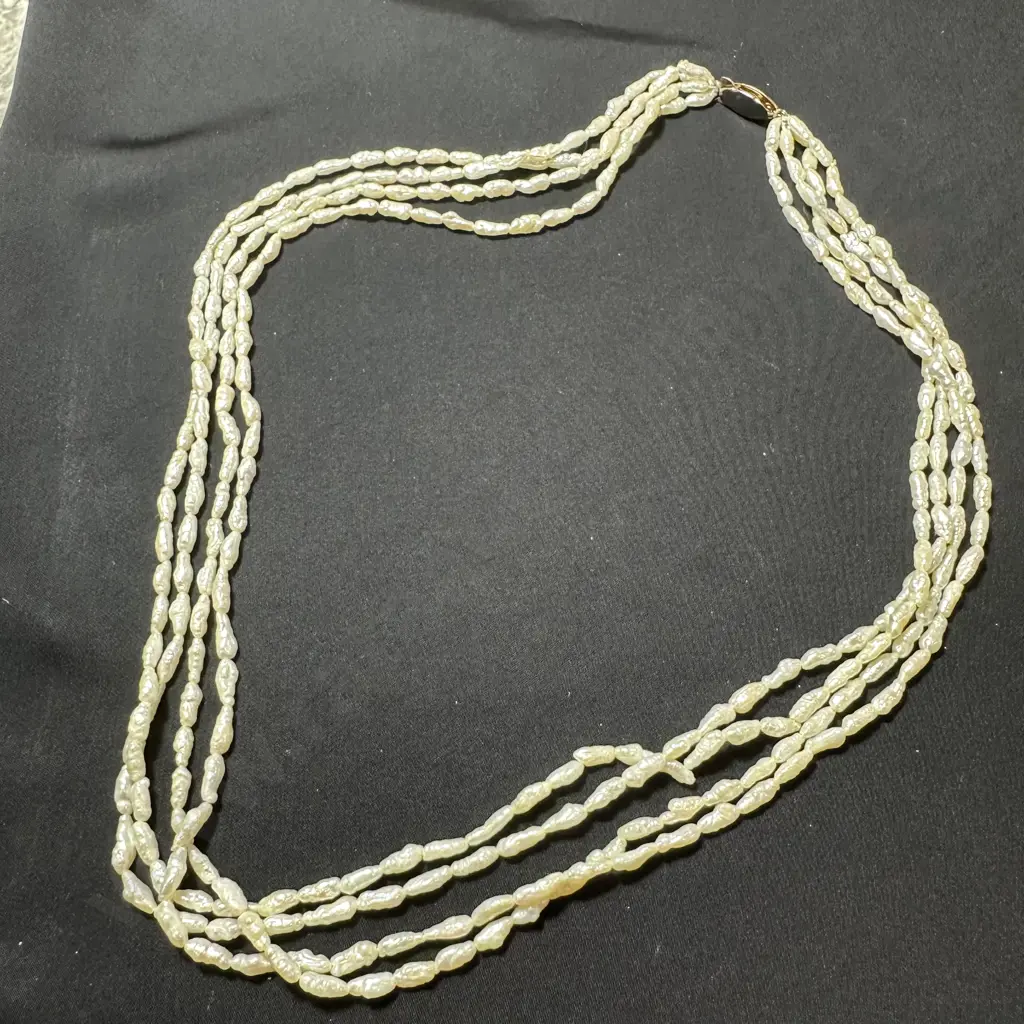 4 Strand necklace of freshwater pearls Image 1++