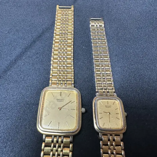 Pr of Seiko his and her watches with serial numbers