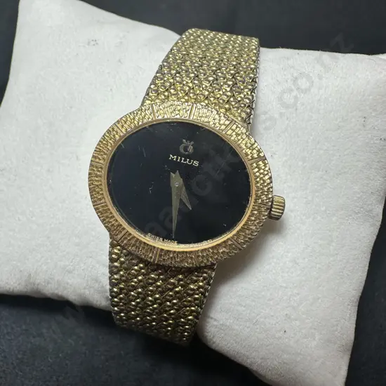 Milus ladies swiss made watch with serial number