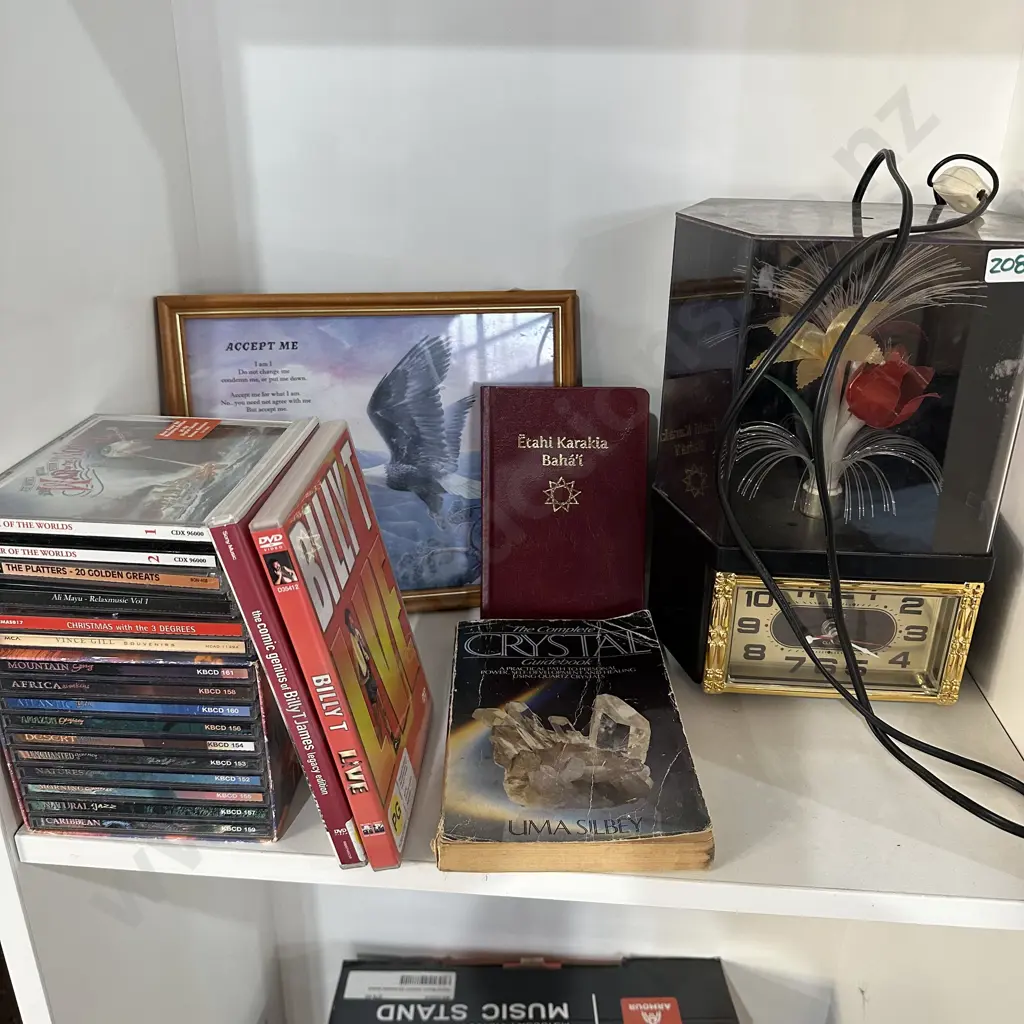 Shelf lot CDs DVDs, decorative clock etc Image 1++