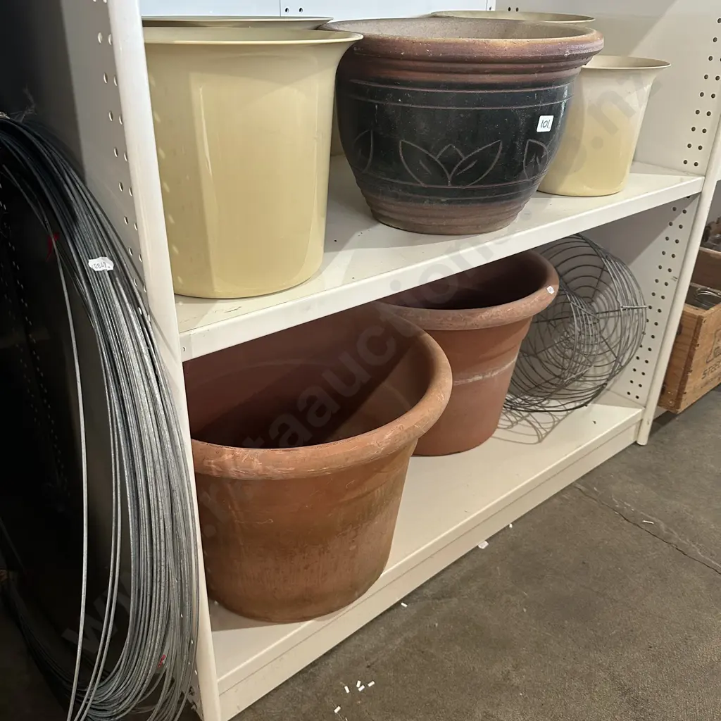 2 shelves of planters and wire Image 1++