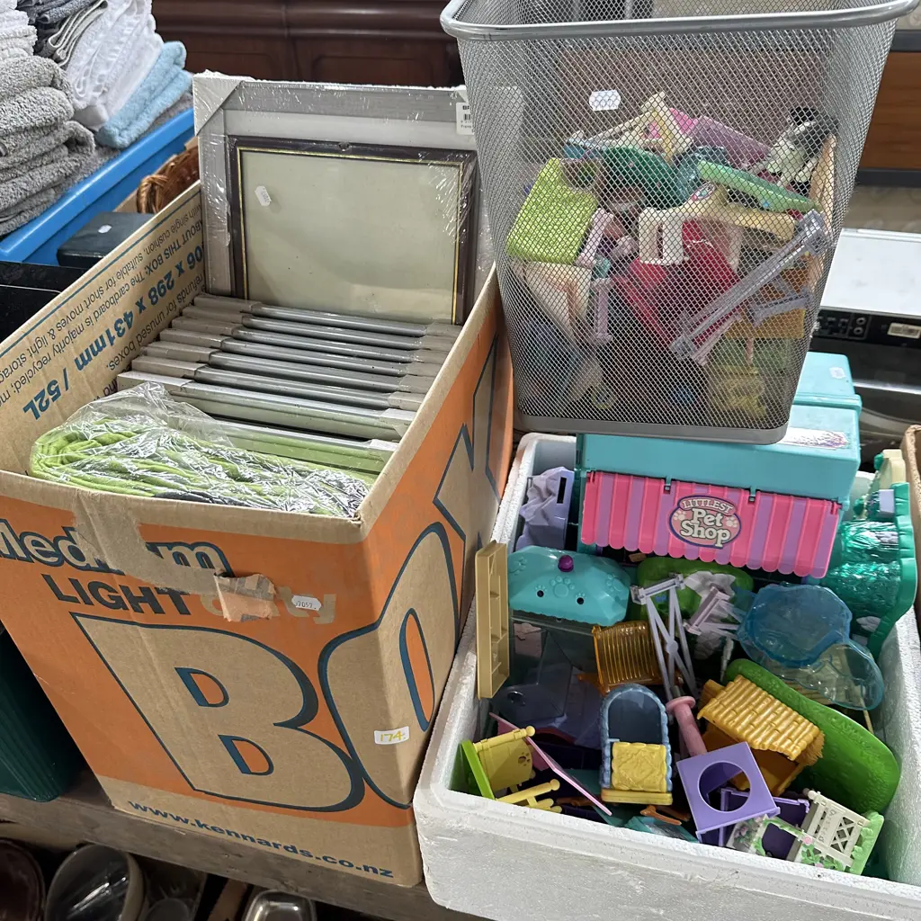 2 Boxes, new picture frames and toys Image 1++