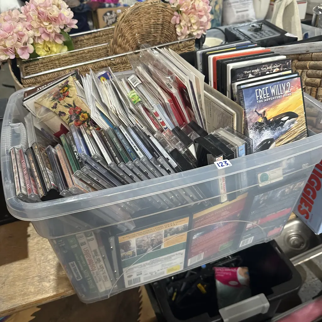 Bin of CDs and DVDs Image 1++