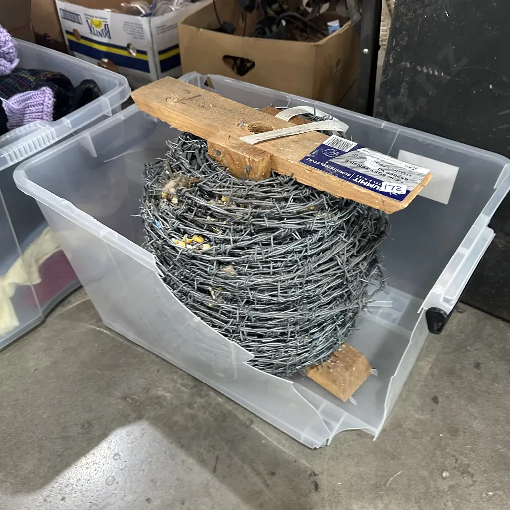 Roll of unused barbed wire Image 1++