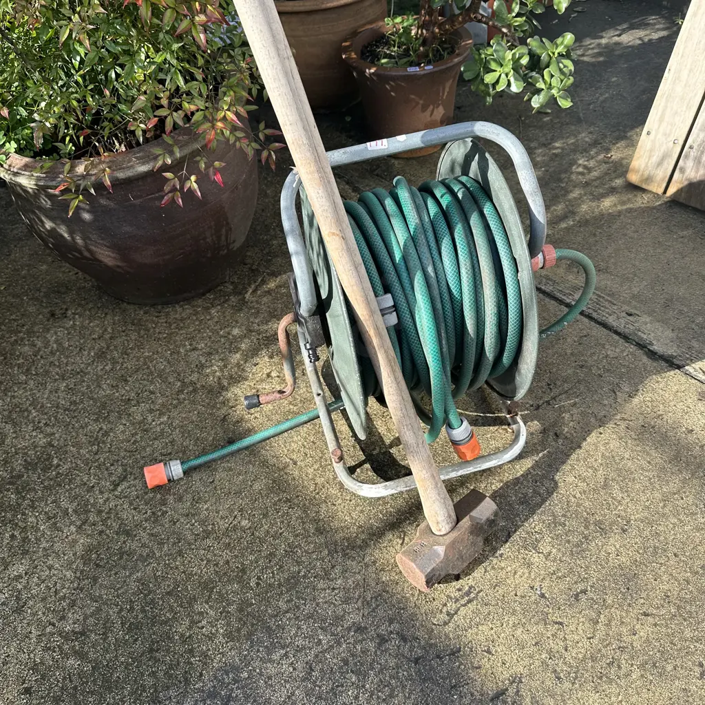 sledge hammer and hose reel Image 1++