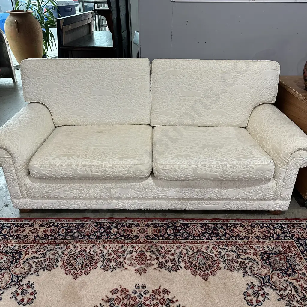 Sofa by Wilson & Nicholson of Auckland,  Andrew Martin fabric depicting jungle animals Image 1++