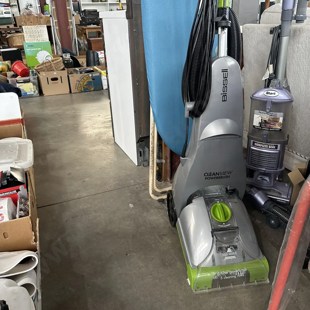 Bissell plus a mop and iron board Image 1++