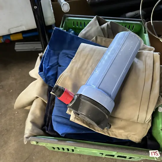 Bin of overalls etc