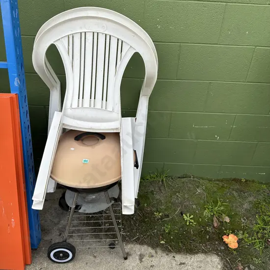 2 plastic chairs and BBQ