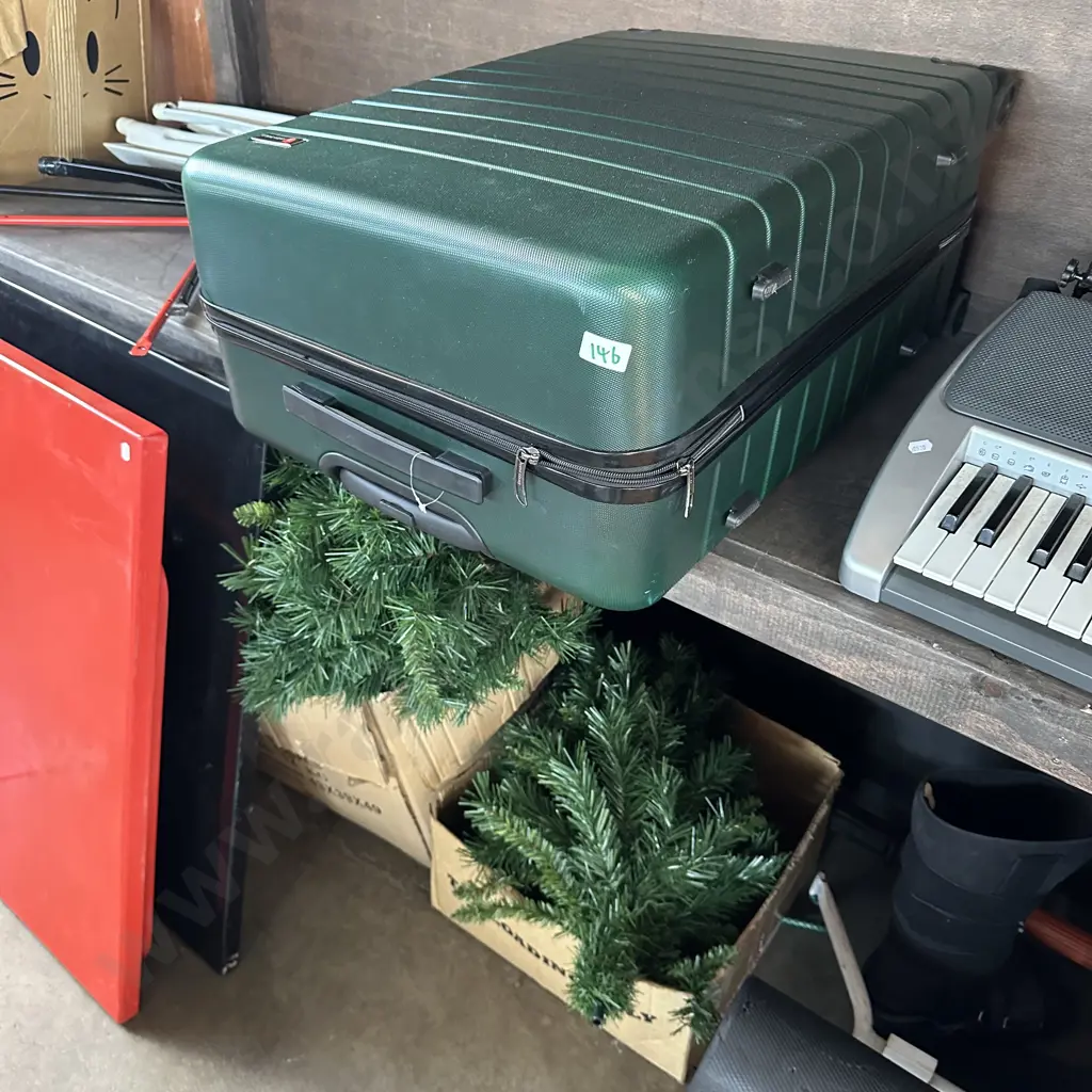 xmas tree, bike rack, foot brace, roll and suitcase with missing wheel Image 1++