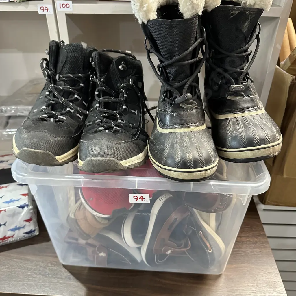 Bin of various shoes Image 1++