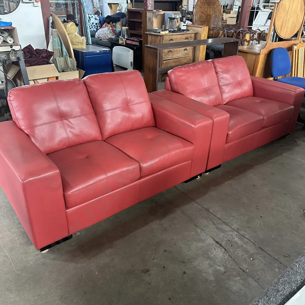 Pair of tidy red leather 2 seater sofas Image 1++