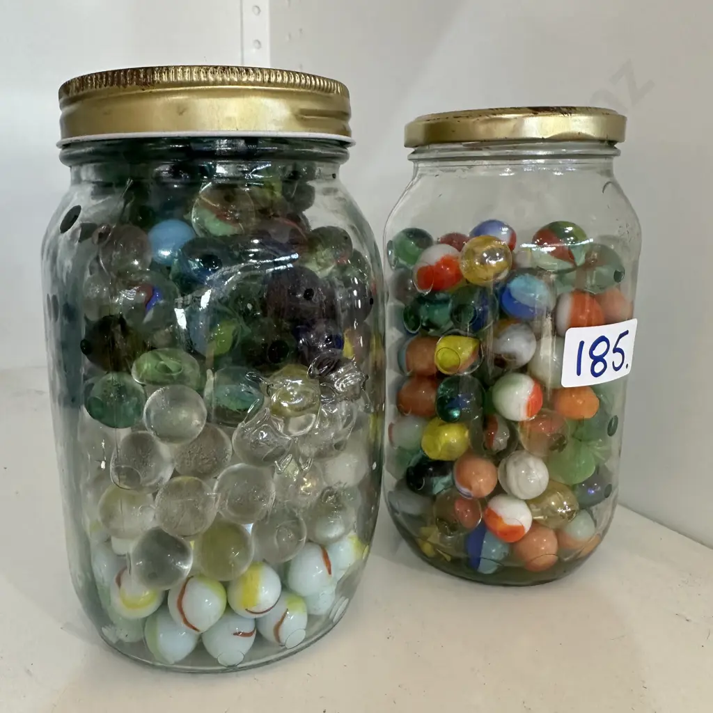 2 jars marbles Image 1++
