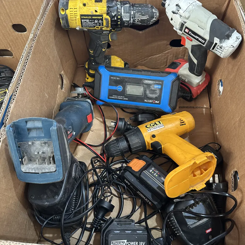 Selection of battery tools and chargers Image 1++