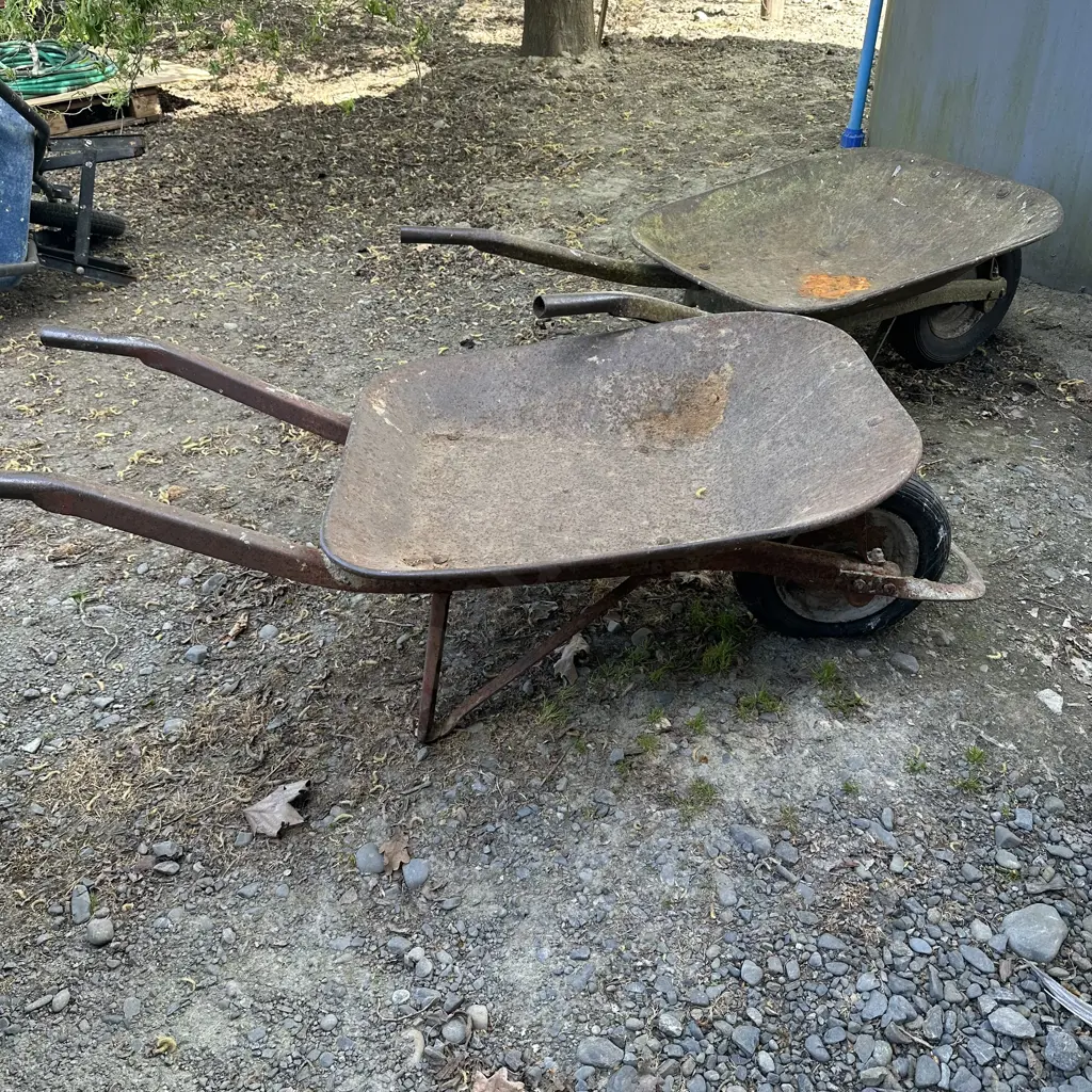 2 vintage wheel barrows (one broken handle) Image 1++