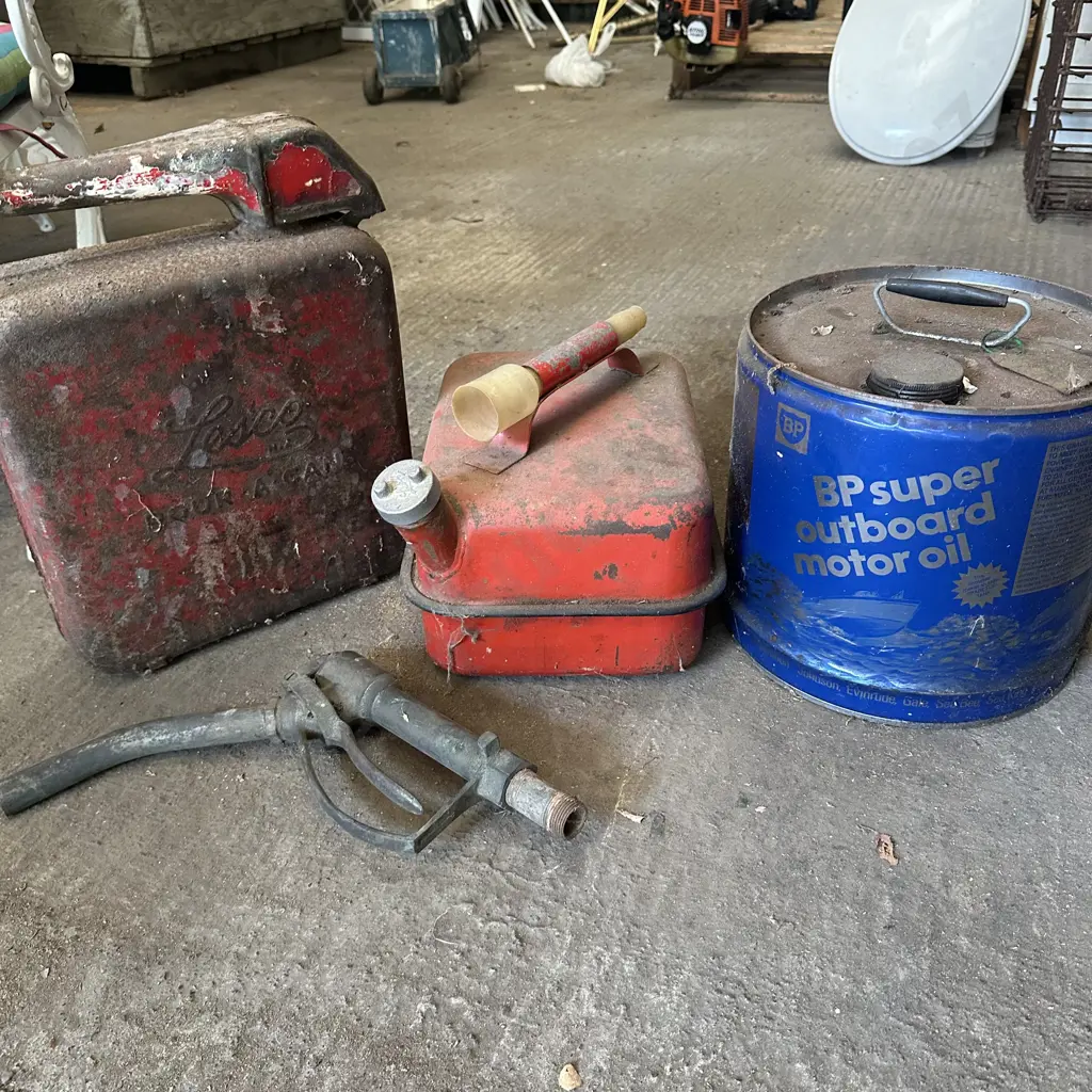 3 petrol cans and pump handle Image 1++