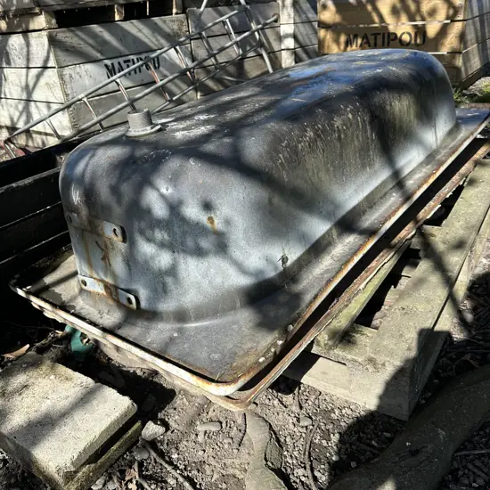 2 old bath tubs
