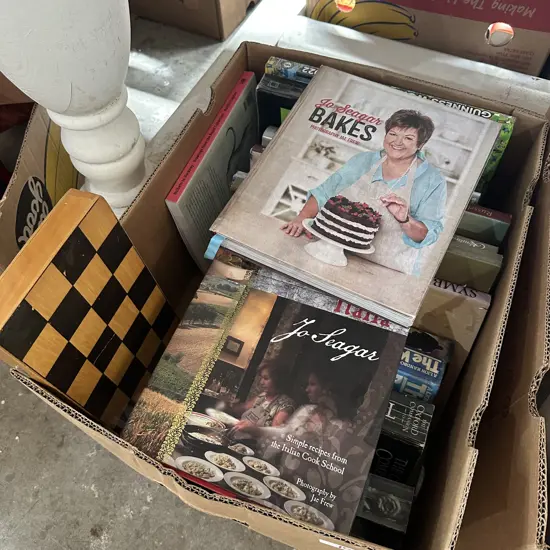 Box of books and chess set