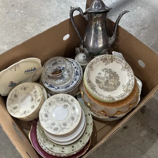 Silver jug and china