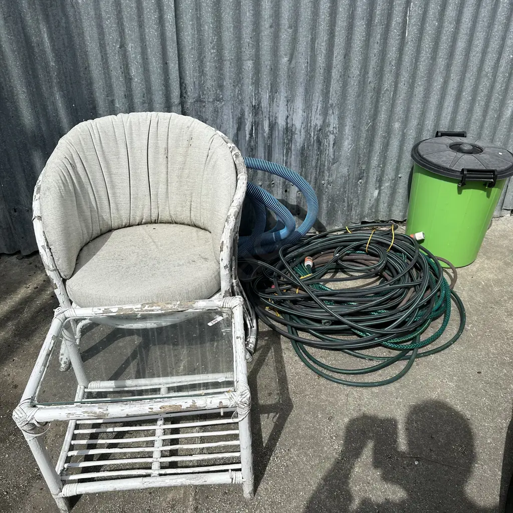 Cane chair and table,hoses and bin Image 1++