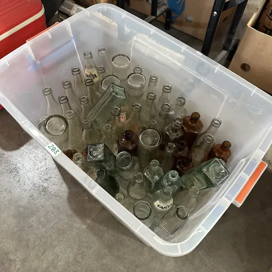 bin of vintage bottles