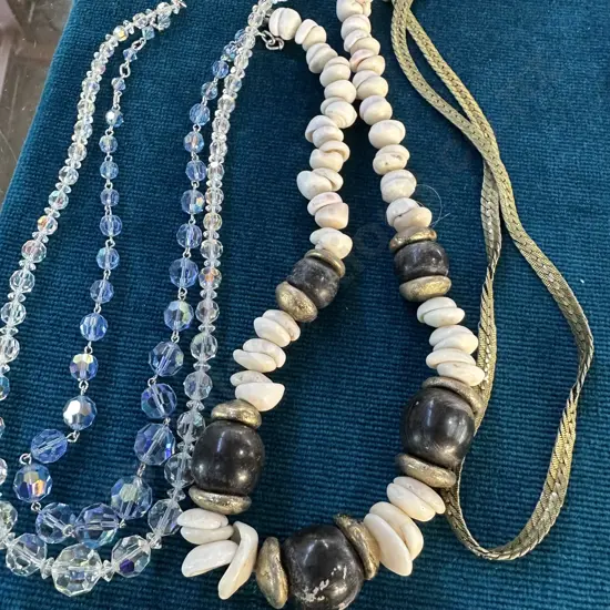 4 necklace inc Emma Page