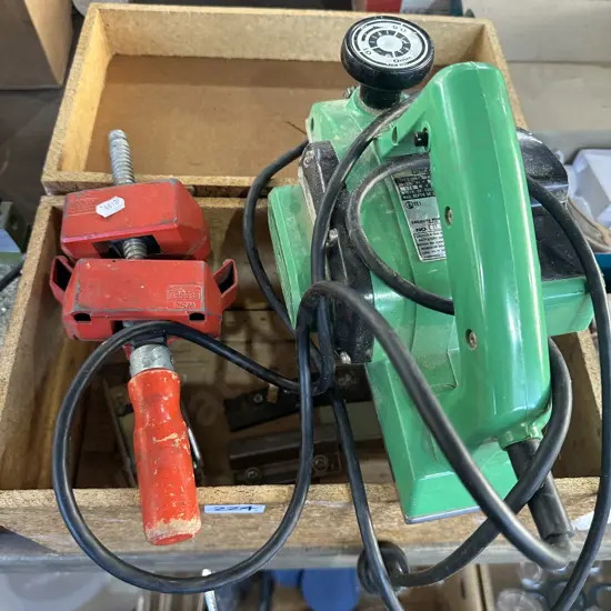 Wooden box with planer and mitre vice.